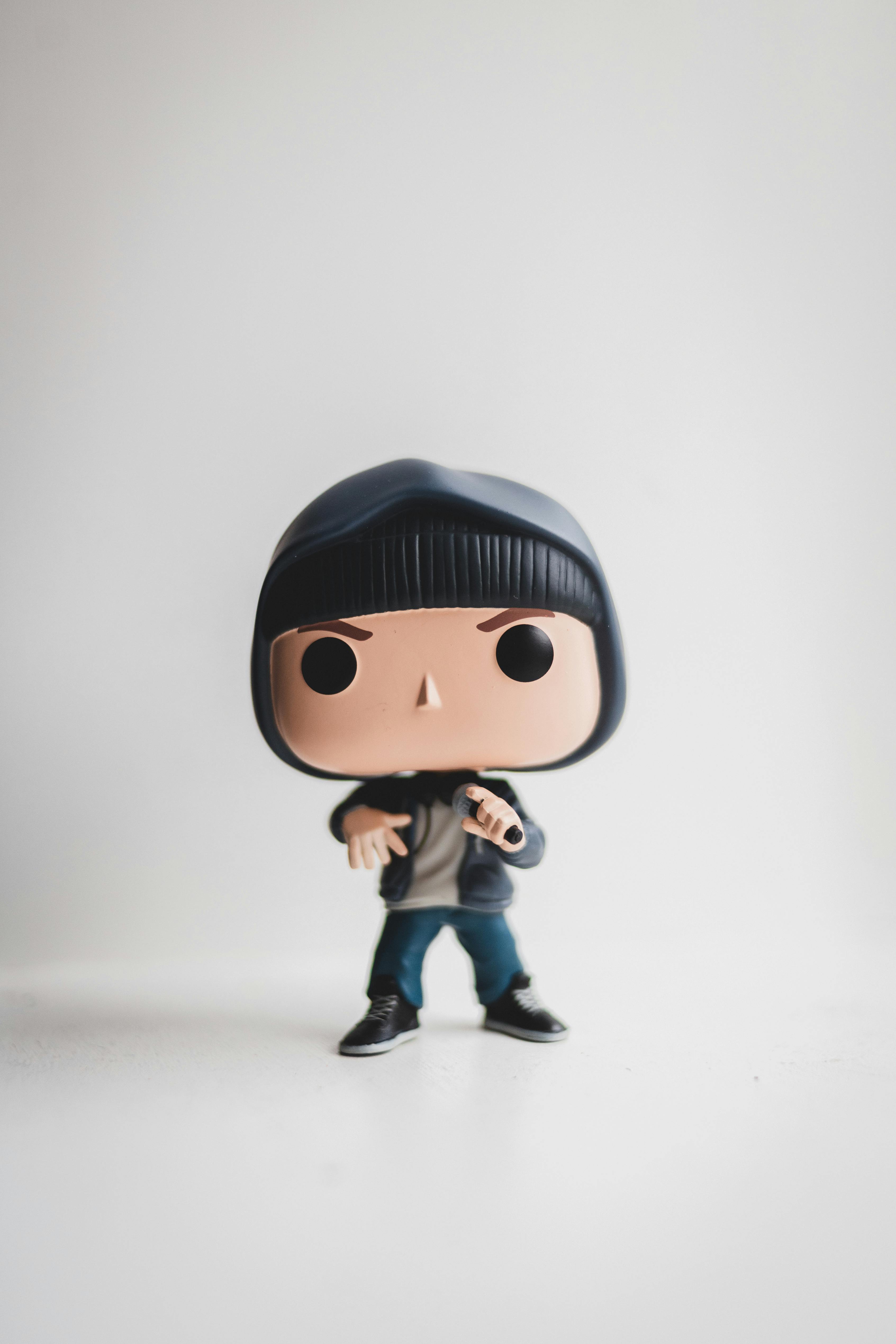 Full length of collectible little figurine of character of film wearing jeans and hoodie